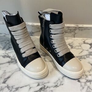 Stylish Black and Cream High-Top Sneakers